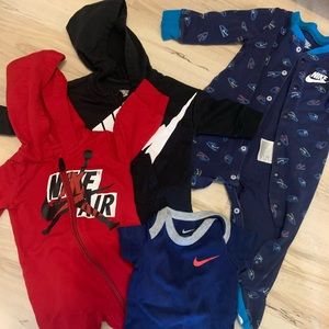 Nike baby onesies